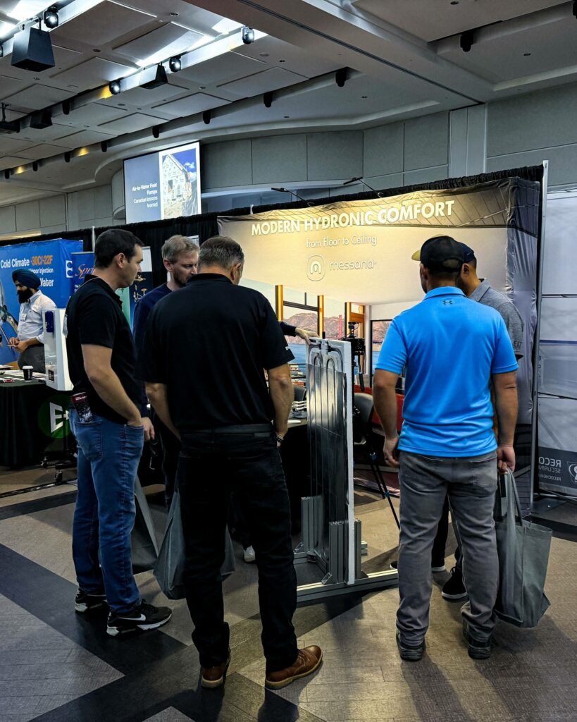 Messana co-founder, Francesco Marchesi, showing MHS attendees our Ray Magic®NK radiant ceiling panel