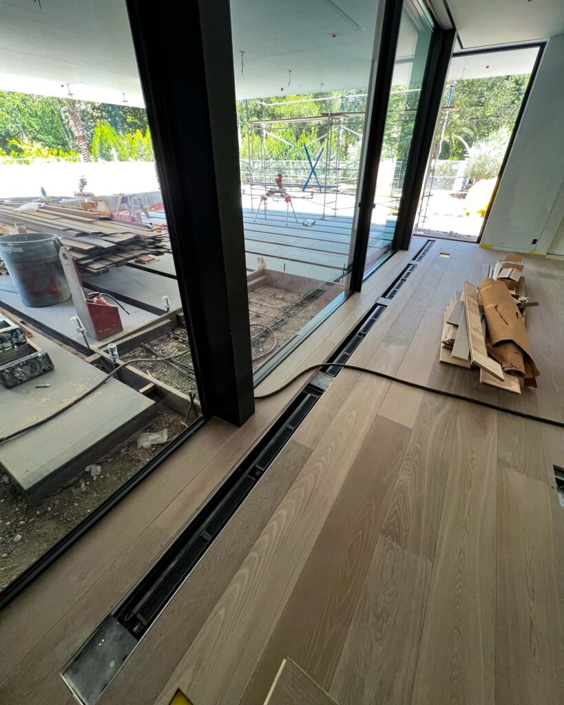 Jaga hydronic fan coil units, managed via Messana Controls, for heating and cooling in an Atherton Residential Project.