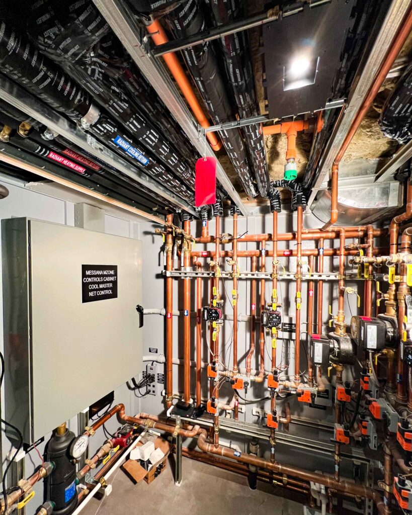 Mechanical room for a hydronic system that utilizes Messana Controls alongside CoolMaster Net.