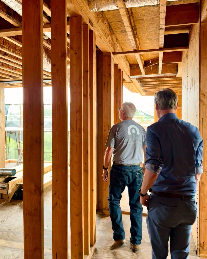 Ed Kline and Francesco Marchesi on-site at a home in construction, that will utilize a Messana Hydronic System.