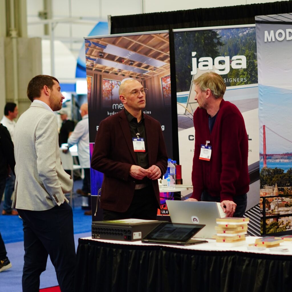 Francesco discussing modern hydronic solutions with attendees at the International Builders Show.
